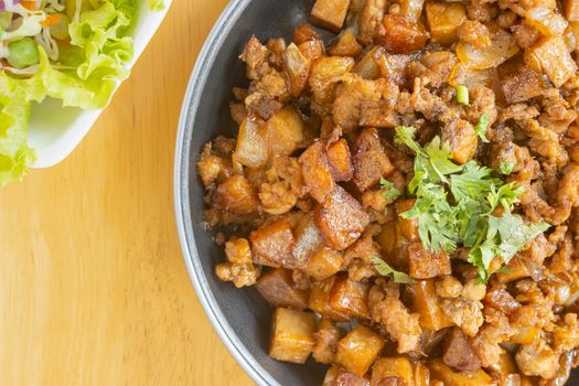 Stir Fried Pork with Onion and Garlic and Black Soy Sauce and Coriander Topping and Tofu with Vegan Salad on Right Frame and Flaylay View