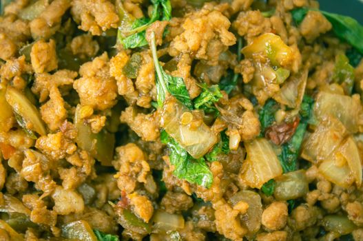 Stir-Fried Pork and Holy Basil and Chili in Close Up View. Delicious Thailand Food Menu for Health in Vintage Tone