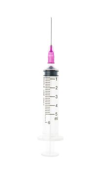 Plastic purple syringe isolated on white background. Single use medical equipment in hospital for injection.