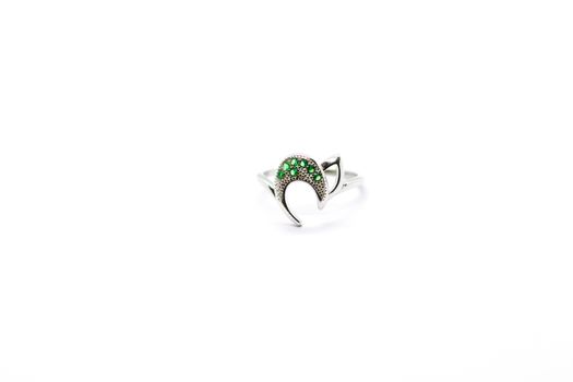 silver female ring design with green diamond on the white background