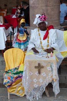 Havana, Cuba - 1 February 2015: Cuban santeria practitioners on Plaza de la Catedral