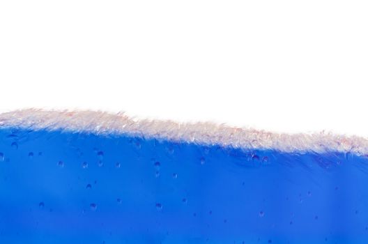 Closeup of a blue liquid, water, background image.