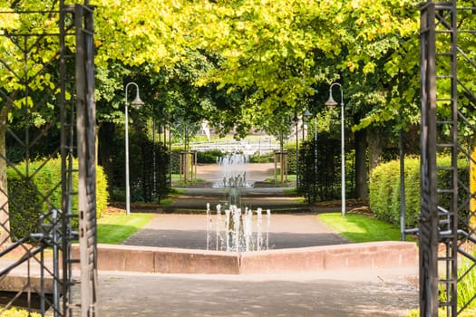 Small weir waterfall fountain in a public park