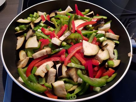 Grilled vegetables in a cast iron grill pan, top view