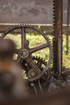 Detail of old rusty gears of a vintage industrial machinery