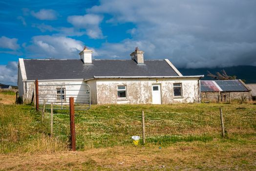 An old abandoned farmhouse on a hill in County Mayo, Ireland.