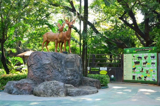 BANGKOK, TH - DEC 13: Deer statue at Dusit Zoo on December 13, 2016 in Khao Din Park, Bangkok, Thailand. Dusit Zoo is the oldest zoo in Bangkok, Thailand.