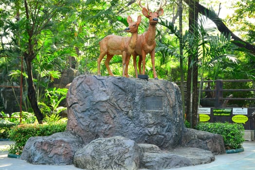 BANGKOK, TH - DEC 13: Deer statue at Dusit Zoo on December 13, 2016 in Khao Din Park, Bangkok, Thailand. Dusit Zoo is the oldest zoo in Bangkok, Thailand.
