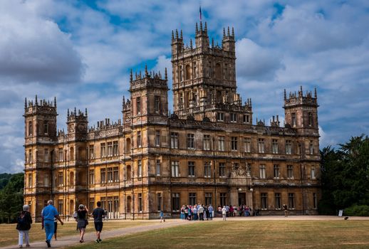 Newbury, England--July 18, 2018. Tourists visit Highclere Castle on a 5,000 acre estate in Hampshire England. It is the location for shooting the PBS series Downton Abbey.