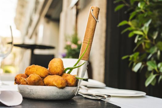 Spanish croquettes, breaded, and fried in olive oil.