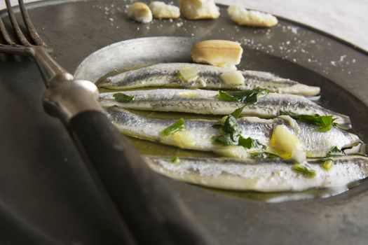 anchovies in vinegar with garlic and olive oil