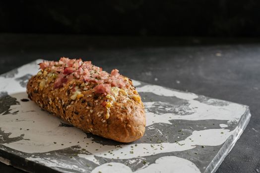 Fresh baked cheesy pull apart bread, with garlic, olive oil and herbs butter