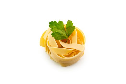 Tagliatelle raw pasta nest egg to dry,
on isolated background