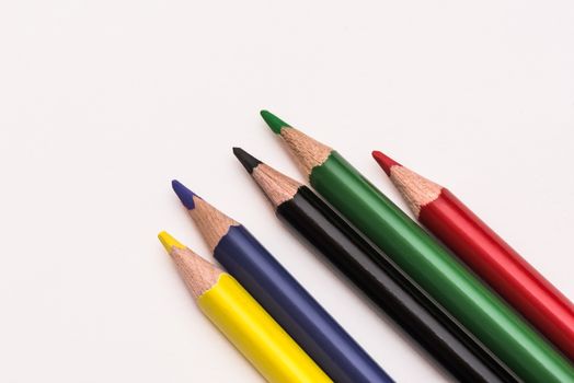 five Colour pencils, colored pencils lay in a heap, school design, items for school design, colored flat education tools, copyspace