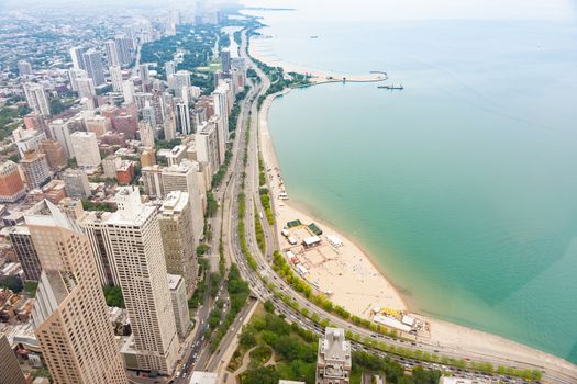 Lake and shoreline around architecture and cityscape of  Chicago, Illinois, USA.