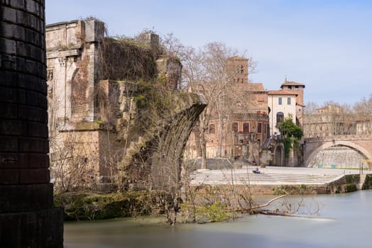 Emilio bridge or Ponte Rotto, ancient Roman bridge over the Tiber river, near the Isola Tiberina island in Rome, Italy