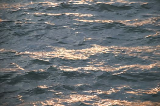 Blue water surface in sunset time