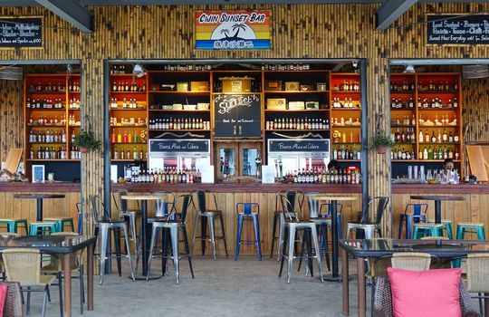 KAOHSIUNG, TAIWAN -- JULY 17, 2017: An outdoor beach side bar and cafe at the popular tourist destination of Cijin Island.