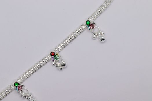 one silver leg chain and blue stone with Anklets for design on white background (anklet)
