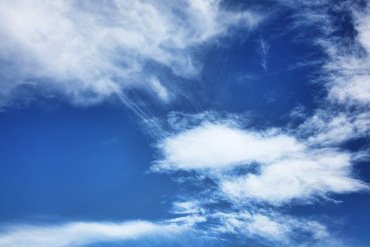 Cloudscape background texture of dramatic cirrus and cumulus clouds stock photo