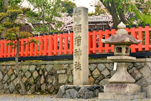 KYOTO, JP - APRIL 10 - Fushimi Inari Taisha shrine on April 10, 2017 in Kyoto, Japan. Fushimi Inari was dedicated to the gods of rice and sake by the Hata family in the 8th century.