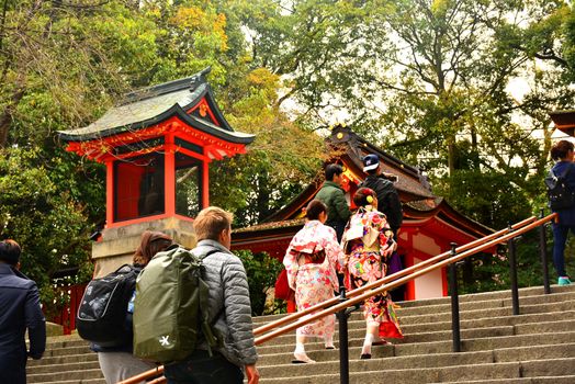 KYOTO, JP - APRIL 10 - Fushimi Inari Taisha steps on April 10, 2017 in Kyoto, Japan. Fushimi Inari was dedicated to the gods of rice and sake by the Hata family in the 8th century.