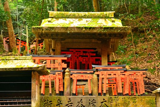 KYOTO, JP - APRIL 10 - Fushimi Inari Taisha shrine on April 10, 2017 in Kyoto, Japan. Fushimi Inari was dedicated to the gods of rice and sake by the Hata family in the 8th century.