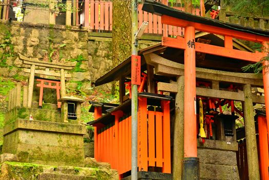 KYOTO, JP - APRIL 10 - Fushimi Inari Taisha shrine on April 10, 2017 in Kyoto, Japan. Fushimi Inari was dedicated to the gods of rice and sake by the Hata family in the 8th century.