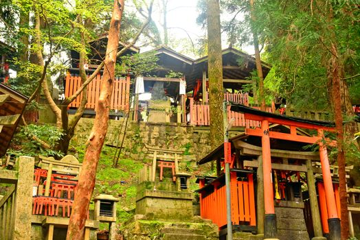 KYOTO, JP - APRIL 10 - Fushimi Inari Taisha shrine on April 10, 2017 in Kyoto, Japan. Fushimi Inari was dedicated to the gods of rice and sake by the Hata family in the 8th century.