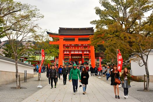KYOTO, JP - APRIL 10 - Fushimi Inari Taisha entrance on April 10, 2017 in Kyoto, Japan. Fushimi Inari was dedicated to the gods of rice and sake by the Hata family in the 8th century.