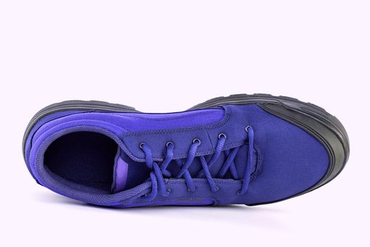 right cheap simple blue hiking shoe isolated on white background - view from above.