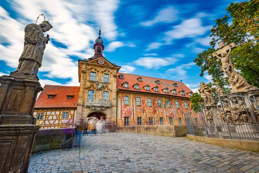 Bamberg city in Germany. Town hall building in background with blue cloudy sky.  Architecture and travel in Europe.