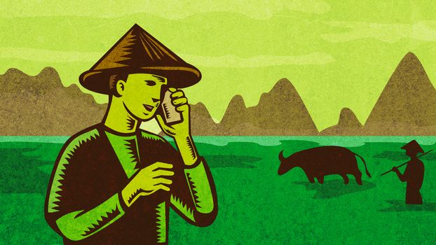 Retro style illustration of a Vietnamese or South East Asian farmer wearing a hat talking on mobile phone or cellphone with paddy field and mountains in background.
