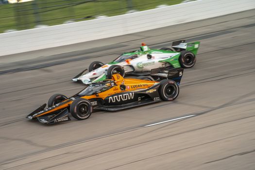 PATO OWARD (5) of Monterey, Mexico races through the turns during the race for the Iowa INDYCAR 250s at Iowa Speedway in Newton, Iowa.