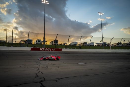 ALEX PALOU (R) (55) of Barcelona, Spain races through the turns during the race for the Iowa INDYCAR 250s at Iowa Speedway in Newton, Iowa.