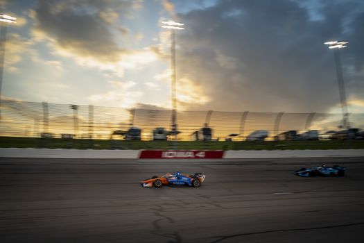 SCOTT DIXON (9) of Auckland, New Zealand races through the turns during the race for the Iowa INDYCAR 250s at Iowa Speedway in Newton, Iowa.