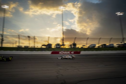 WILL POWER (12) of Toowoomba, Australia races through the turns during the race for the Iowa INDYCAR 250s at Iowa Speedway in Newton, Iowa.