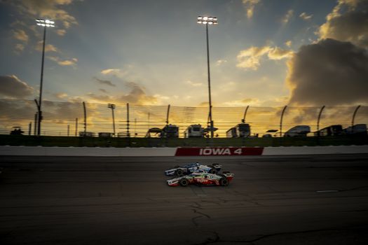 GRAHAM RAHAL (15) of the United States races through the turns during the race for the Iowa INDYCAR 250s at Iowa Speedway in Newton, Iowa.