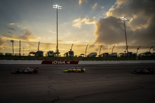 SANTINO FERRUCCI (18) of the United States races through the turns during the race for the Iowa INDYCAR 250s at Iowa Speedway in Newton, Iowa.