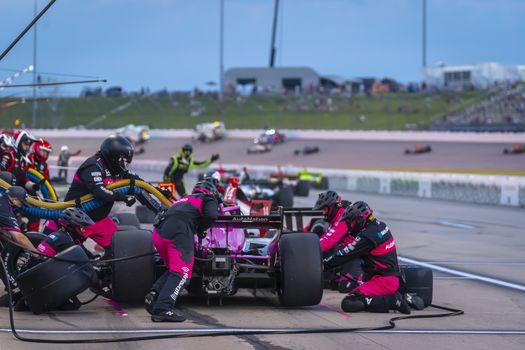 JACK HARVEY (60) of Lincoln, England brings his car in for service during the Iowa INDYCAR 250s at Iowa Speedway in Newton Iowa.