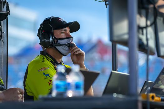 IndyCar Team Manager, Larry Foyt Jr watches as his teams prepare to race for the Iowa INDYCAR 250s at Iowa Speedway in Newton, Iowa.