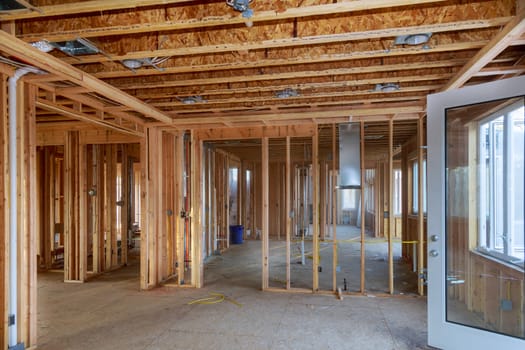 Unfinished of interior view of a house residential construction wall of framing against