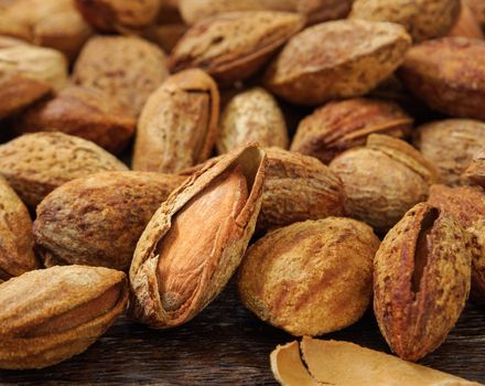 almonds place on a wooden table