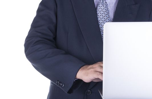 Business man using a computer at work. - isolated over a white background