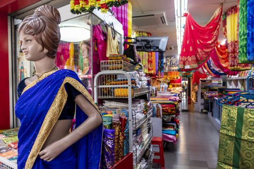 Mannequin in front of a colorful sari shop in Little India, Singapore.