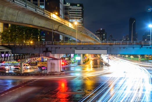 Blur light of traffic at Saladang junction in city