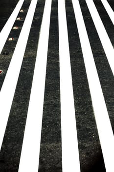 Extreme close up shot of cross walks or zebra crossing on roads.