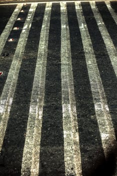 Extreme close up shot of cross walks or zebra crossing on roads.