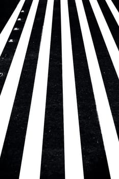 Extreme close up shot of cross walks or zebra crossing on roads.