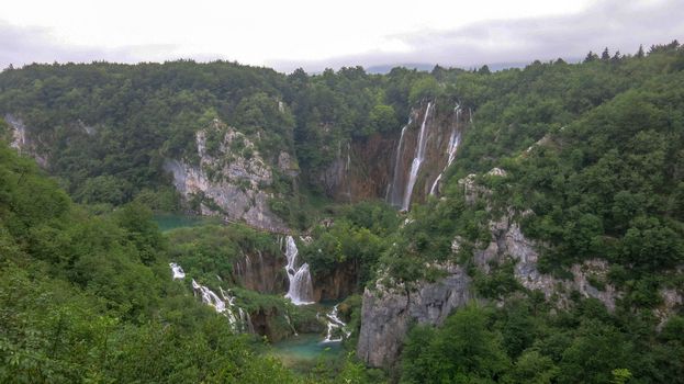 Breathtaking aerial view of waterfalls in the Plitvice Lakes National Park, Croatia.